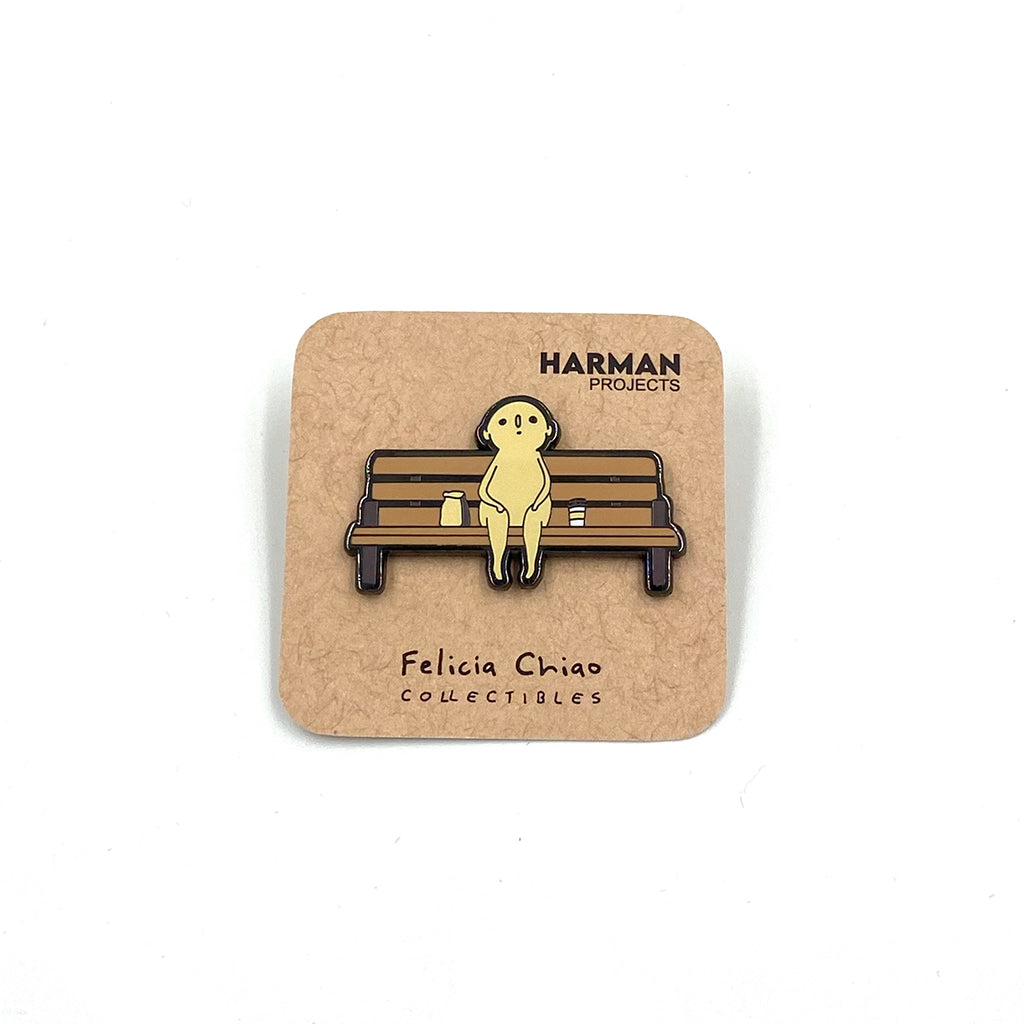 by Felicia Chiao titled Felicia Chiao - "Bench" Enamel Pin