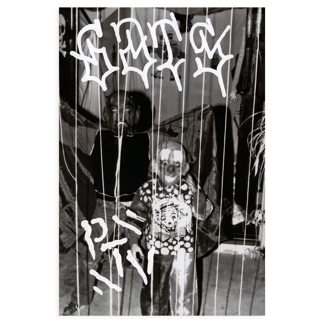 hand painted black and white found photograph by GATS depicting two children trick or treating