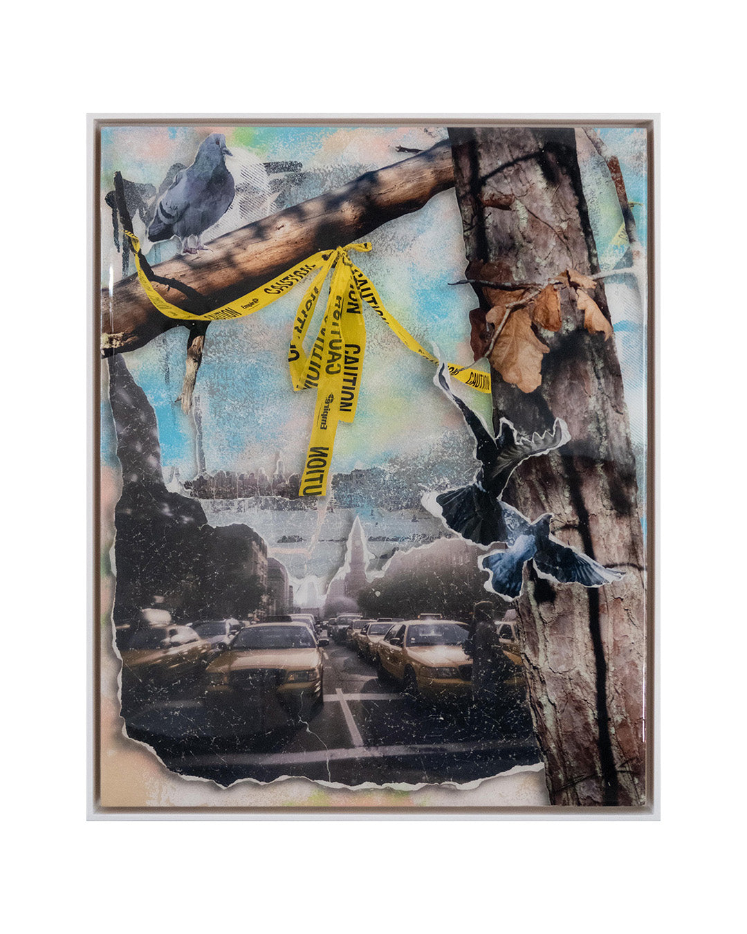 Collage art with a tree, caution tape, and urban scene