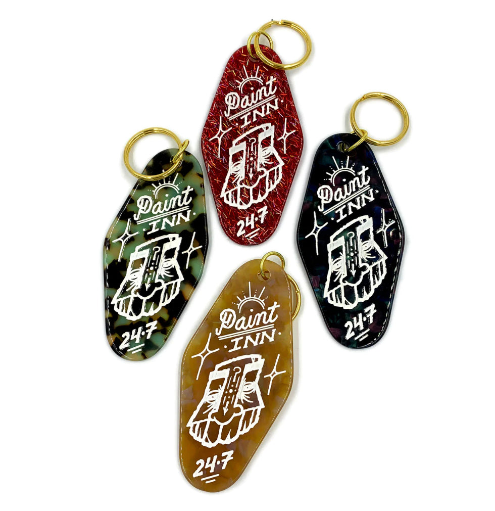 by GATS titled GATS - "Paint INN 24.7" keychain